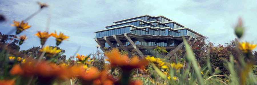 Photo of UC San Diego Geisel Library - with orange flowers in the foreground