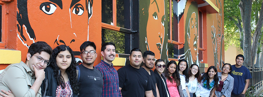 UC San Diego students serve as hosts at an information table